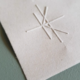 Logo Imprinted on Paper with Embosser