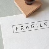 Fragile Stamp