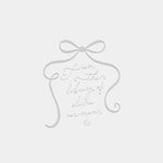 Decorative bow with text 'from the library of' on a light gray background used for a book embosser
