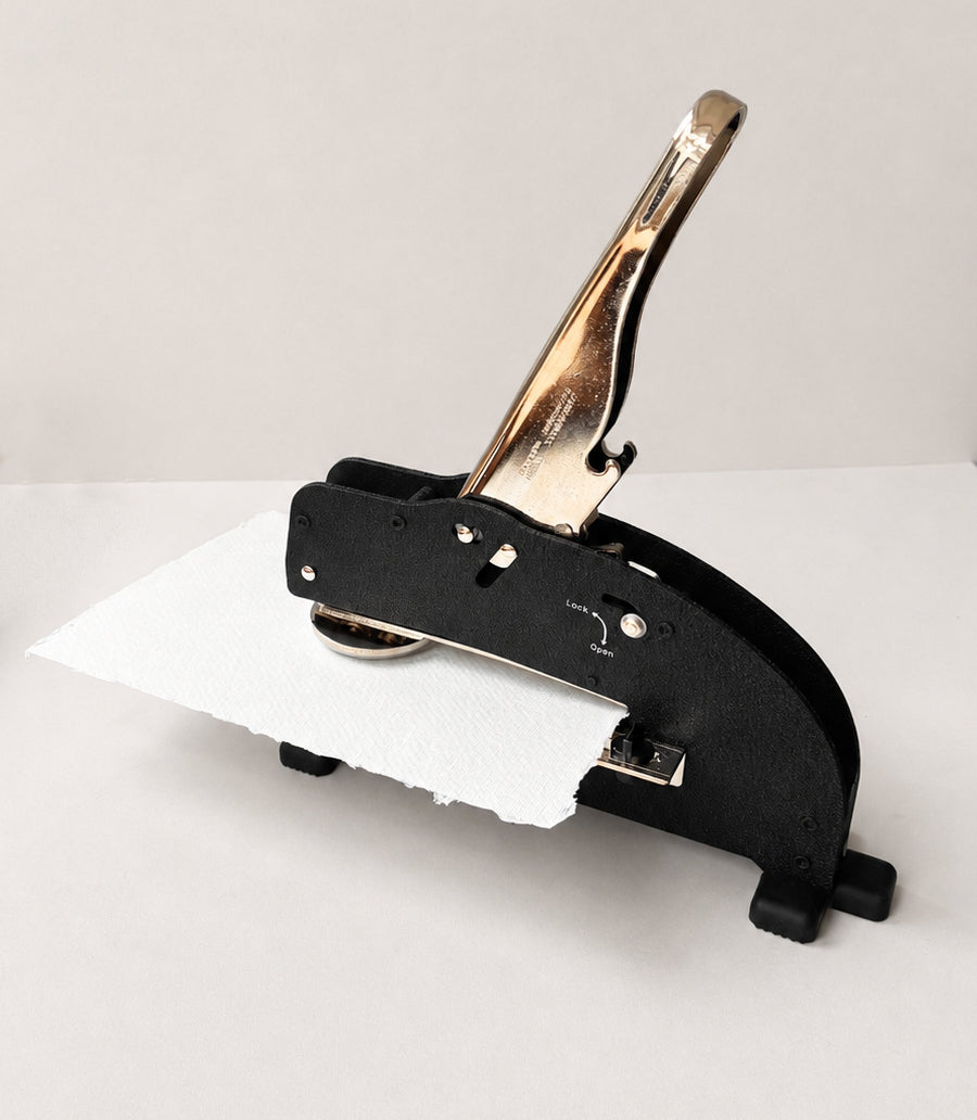 custom long reach embosser embossing a piece of paper 
