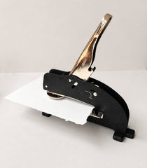 custom long reach embosser embossing a piece of paper 
