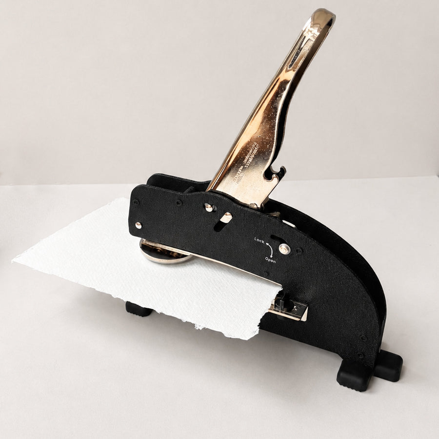 custom long reach embosser embossing a piece of paper 