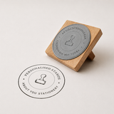 Large personalised rubber stamp with a custom logo stamp impression on white paper, ideal for branding packaging, paper bags, boxes and stationery.