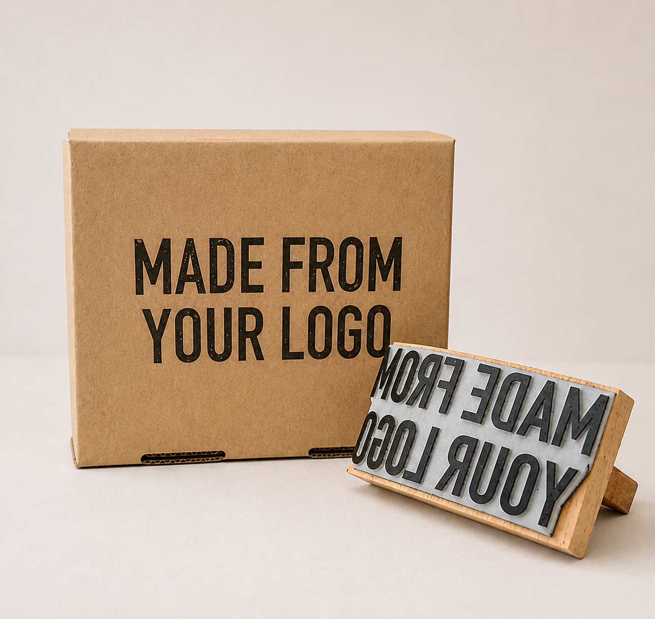 Large custom rubber stamp with a stamped logo impression on a kraft paper box