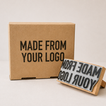 Large custom rubber stamp with a stamped logo impression on a kraft paper box