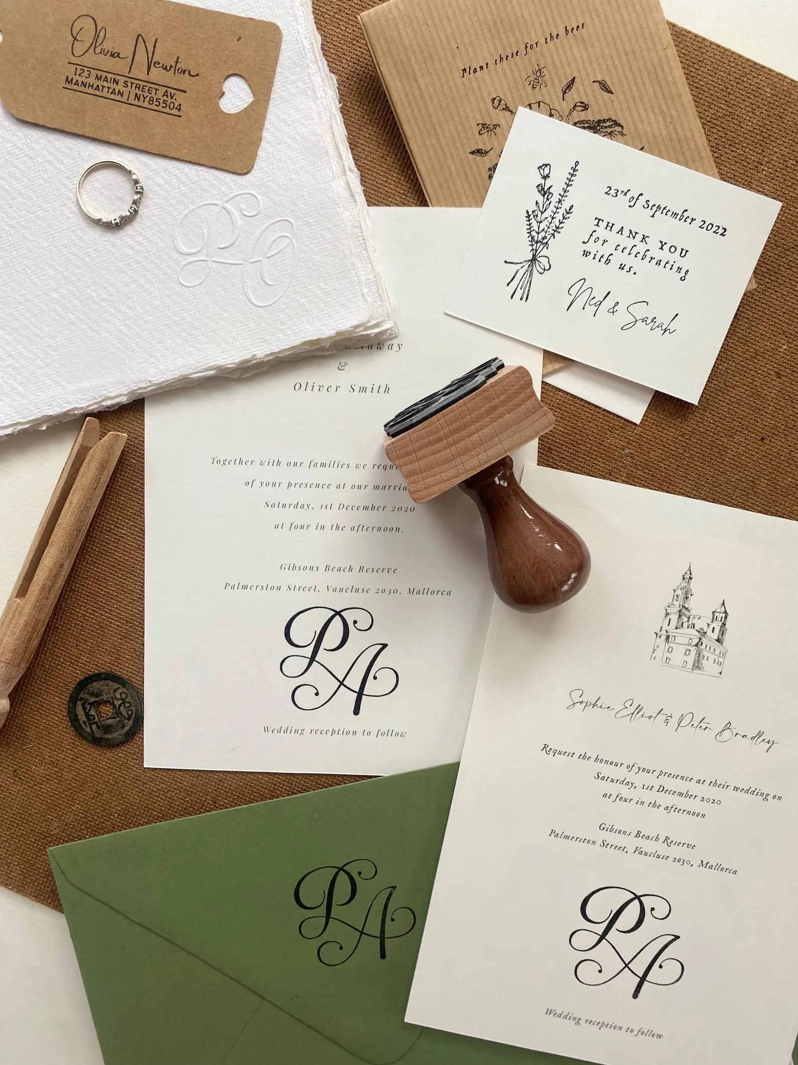 Custom rubber stamps and embosser used on elegant wedding stationery and small business branding