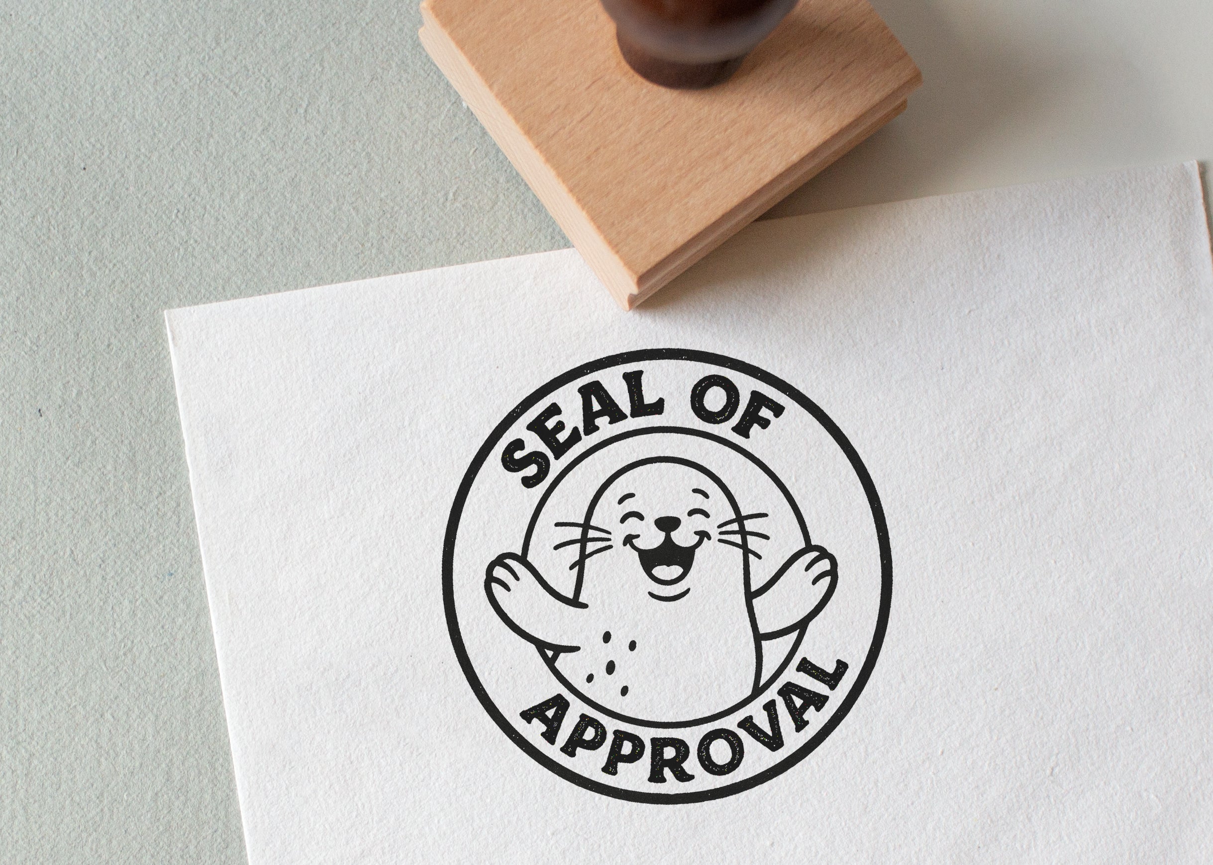 rubber stamp featuring an illustration of a seal with the wording 'seal of approval' to use in classroom