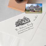 Home Address Stamp with Custom House Illustration stamped onto an envelope.