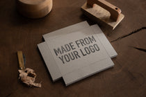 custom large logo stamp with the wording 'made from your logo' stamped onto a kraft wooden box