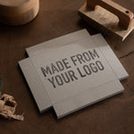 custom large logo stamp with the wording 'made from your logo' stamped onto a kraft wooden box