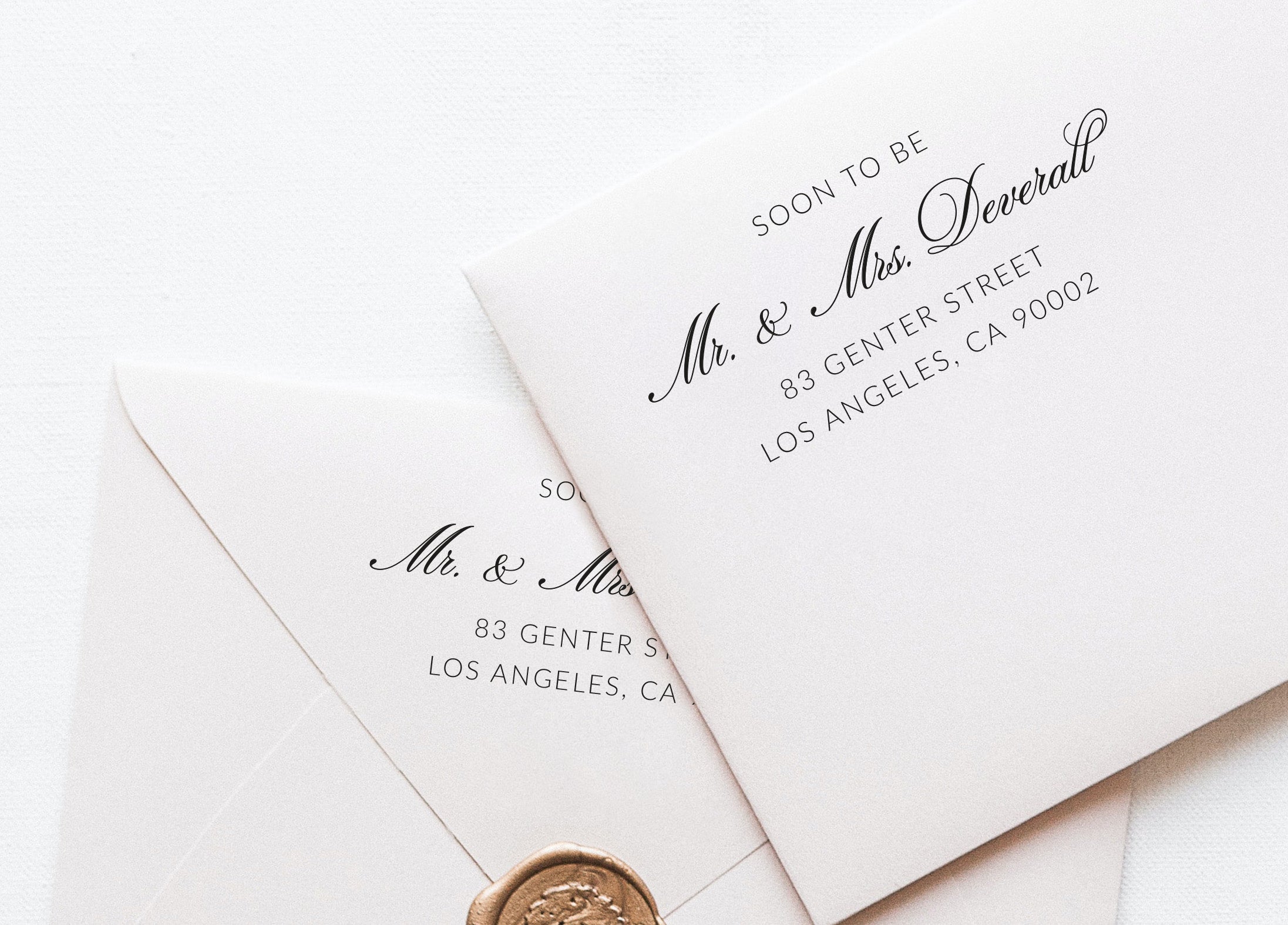 Modern custom wedding address stamp with the wording "soon to be + couples' names and address"