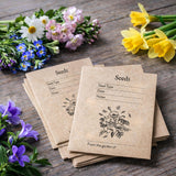 Personalised seed packet rubber stamp with botanical illustration on kraft envelopes for seeds with a custom garden name
