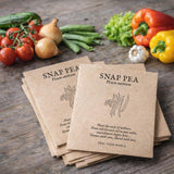 Personalised vegetable seed packet rubber stamp on kraft envelopes with seed type and harvest date