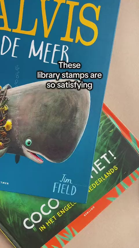 Kids Book Rubber Stamp featuring a beautiful illustration of an owl reading a book with the wording 'this book belongs to' being stamped onto a book page