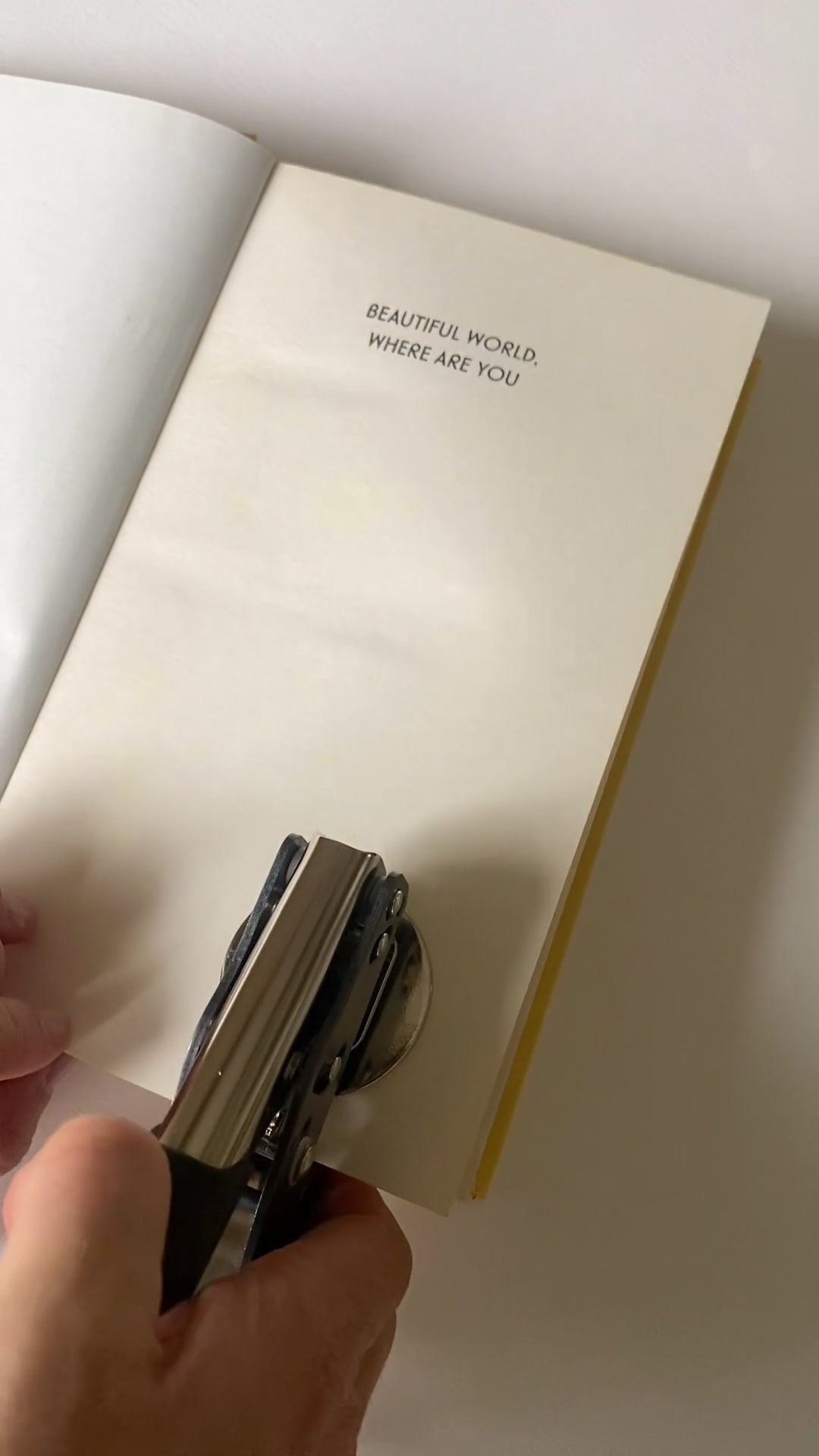 Video featuring an eco-friendly, green,  self-inking logo stamp stamping a logo with the wording 'your logo here' onto brown kraft paper