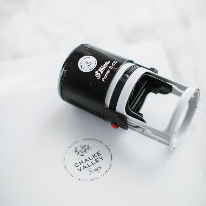 Round self-inking logo stamp, ideal for circular logos, providing a clean and professional impression for business branding.