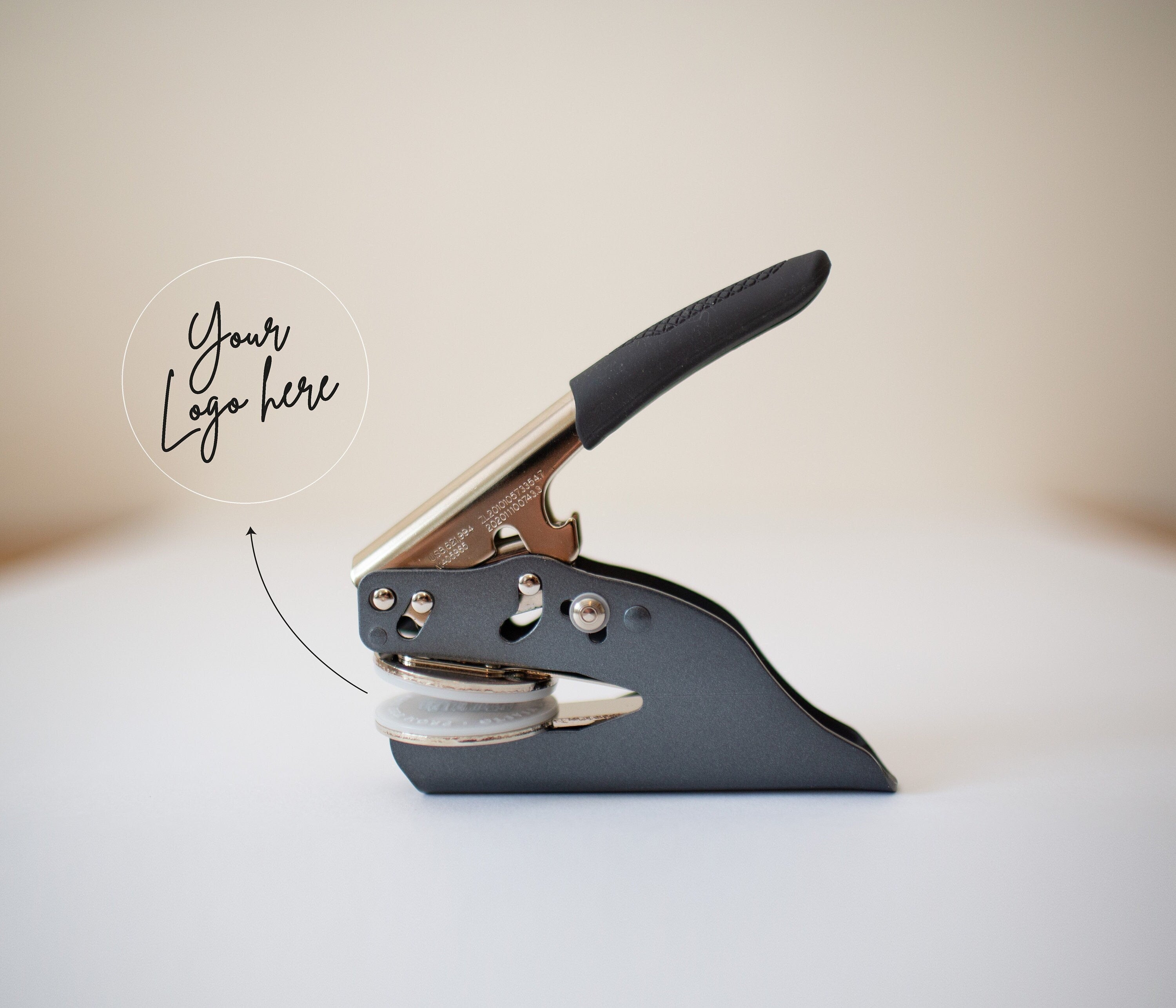 Custom paper embosser with personalized logo