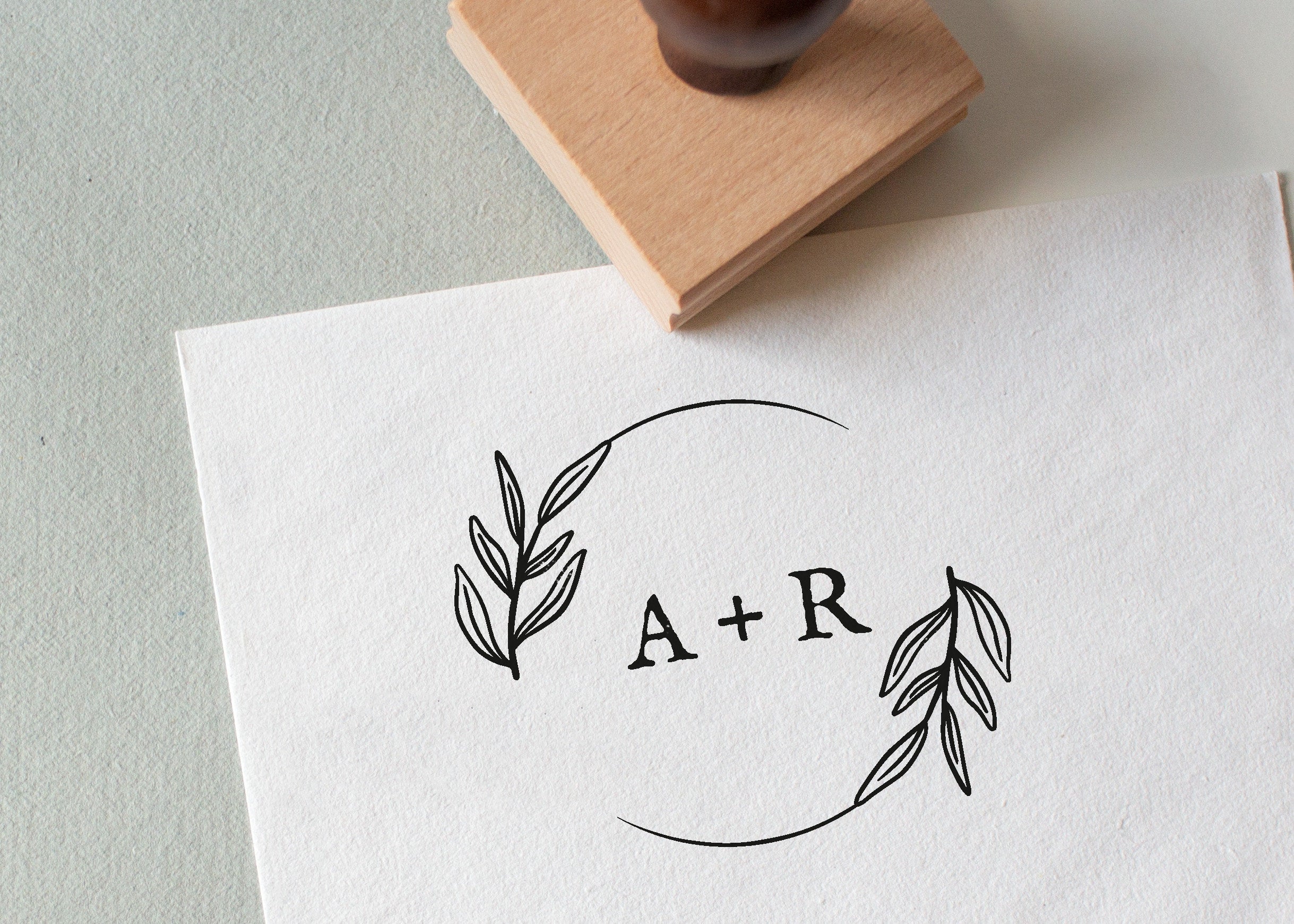 Initials Wedding Stamp featuring initials and a wreath illustration